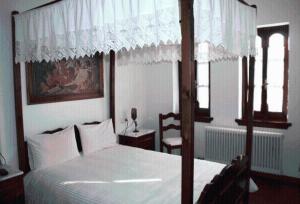 Postel nebo postele na pokoji v ubytování Hotel Petrino