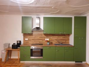 Cucina o angolo cottura di Gasthof Grüner Baum