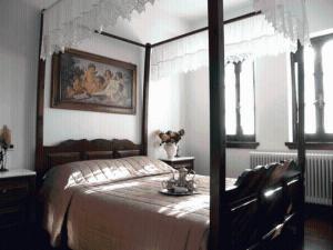 Postel nebo postele na pokoji v ubytování Hotel Petrino