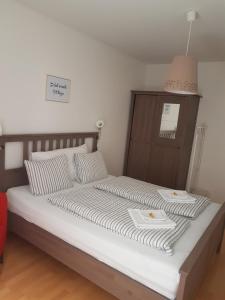 Postel nebo postele na pokoji v ubytování Rhii B&B