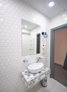 Koupelna v ubytování Betlemi Hotel
