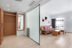 Postel nebo postele na pokoji v ubytování Hotel Timor