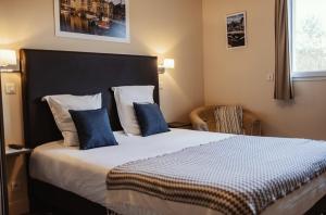 Postel nebo postele na pokoji v ubytování La Fraîchette-Hôtel & Spa
