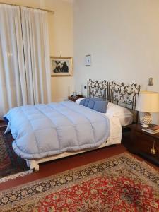 A bed or beds in a room at Villa Lavagnino