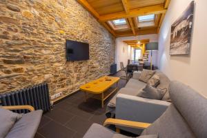 A seating area at Casa Alameda 23 de Casas Das Figueiras en Ría Eo-Ribadeo