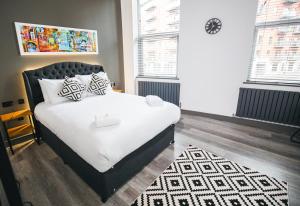 Postel nebo postele na pokoji v ubytování Black Lion Hotel Manchester