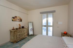 A bed or beds in a room at Casa Francesco