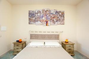 A bed or beds in a room at Casa Francesco