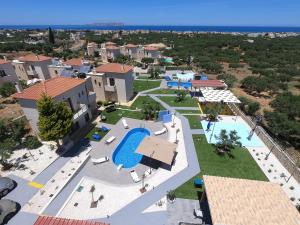 an aerial view of a resort with a swimming pool at Anna Luxury Sea View Private Villa in Gouves