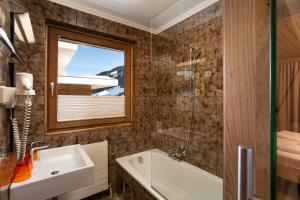 Kúpeľňa v ubytovaní Appartementhaus Tannenberg + 9 fotografií