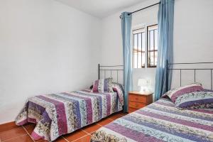 Posteľ alebo postele v izbe v ubytovaní Casa Antonia 2