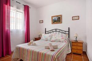 Posteľ alebo postele v izbe v ubytovaní Casa Antonia 2