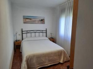 Cama o camas de una habitación en Apartamento Enzo