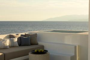 a couch sitting on the side of a boat at PAROCKS Luxury Hotel & Spa in Ambelas