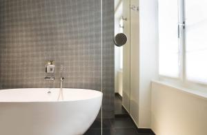 Koupelna v ubytování Hotel Dupond-Smith + 37 fotografií