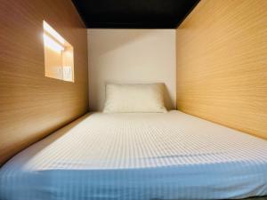 Postel nebo postele na pokoji v ubytování Utopia Hostel