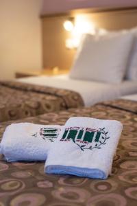 Postel nebo postele na pokoji v ubytování Irini Hotel