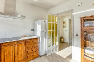 Kuchyňa alebo kuchynka v ubytovaní Apartamento residencial 2º 2ª