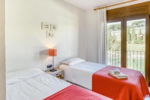 Posteľ alebo postele v izbe v ubytovaní Apartamento residencial 2º 2ª