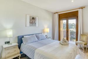Posteľ alebo postele v izbe v ubytovaní Apartamento residencial 2º 2ª
