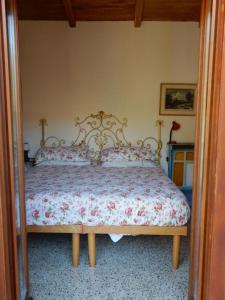 Postel nebo postele na pokoji v ubytování Il Borgo della Colomba