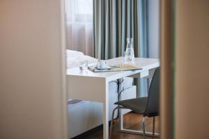 Krevet ili kreveti u jedinici u okviru objekta Hotel am See