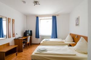 TV a/nebo společenská místnost v ubytování Altstadthotel Wienecke