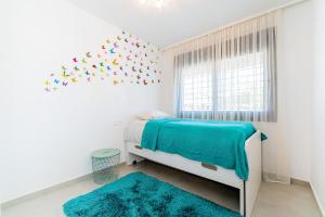 Postel nebo postele na pokoji v ubytování Apartamento Peonia