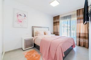 Postel nebo postele na pokoji v ubytování Apartamento Peonia