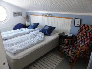 Lugnet i Oslättfors客房内的一张或多张床位