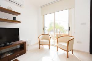 TV a/nebo společenská místnost v ubytování Pernera Holiday Villa 588