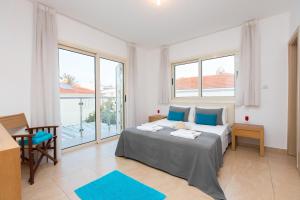 Postel nebo postele na pokoji v ubytování Pernera Holiday Villa 588
