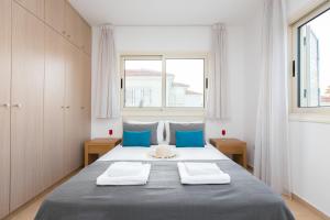 Postel nebo postele na pokoji v ubytování Pernera Holiday Villa 588