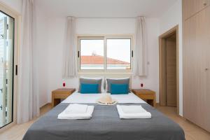 Postel nebo postele na pokoji v ubytování Pernera Holiday Villa 588