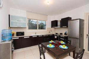 Kuchyň nebo kuchyňský kout v ubytování Pernera Holiday Villa 588