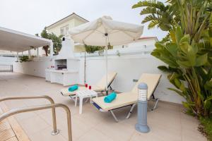 Balkón nebo terasa v ubytování Pernera Holiday Villa 588
