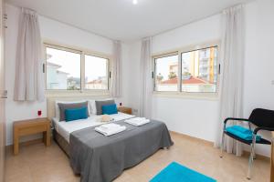 Postel nebo postele na pokoji v ubytování Pernera Holiday Villa 588