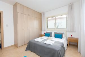 Postel nebo postele na pokoji v ubytování Pernera Holiday Villa 588