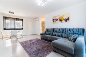 Posezení v ubytování Apartamento Peonia