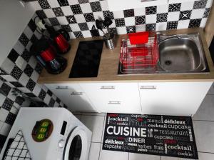 Kuchyň nebo kuchyňský kout v ubytování Le 4midable - Chaleureux 2 pièces
