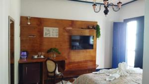 Μια τηλεόραση ή/και κέντρο ψυχαγωγίας στο HOTEL FAZENDA PACIENCIA