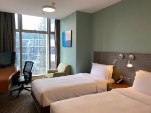 Postel nebo postele na pokoji v ubytování Holiday Inn Express Hong Kong Causeway Bay by IHG + 37 fotografií
