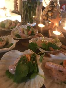 a group of plates of food on a table at Le Bouyssou in Cazes-Mondenard