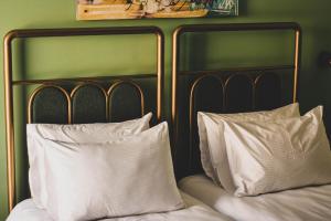 Letto o letti in una camera di Paliani Hotel