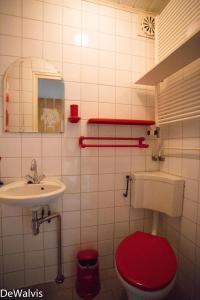 Ένα μπάνιο στο Appartement Walvis nr. 20