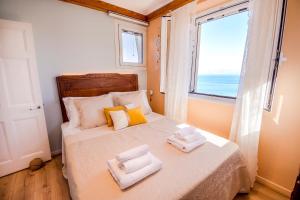 Postel nebo postele na pokoji v ubytování Lighthouse apartment
