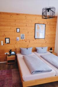 Postel nebo postele na pokoji v ubytování Hacienda Rooms