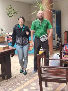 a man and a woman standing in a room at Eye of horus in Cairo