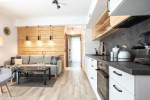 Kuchyňa alebo kuchynka v ubytovaní Apartament Słoneczne Tatry Droga na bystre 5b