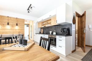 Kuchyňa alebo kuchynka v ubytovaní Apartament Słoneczne Tatry Droga na bystre 5b